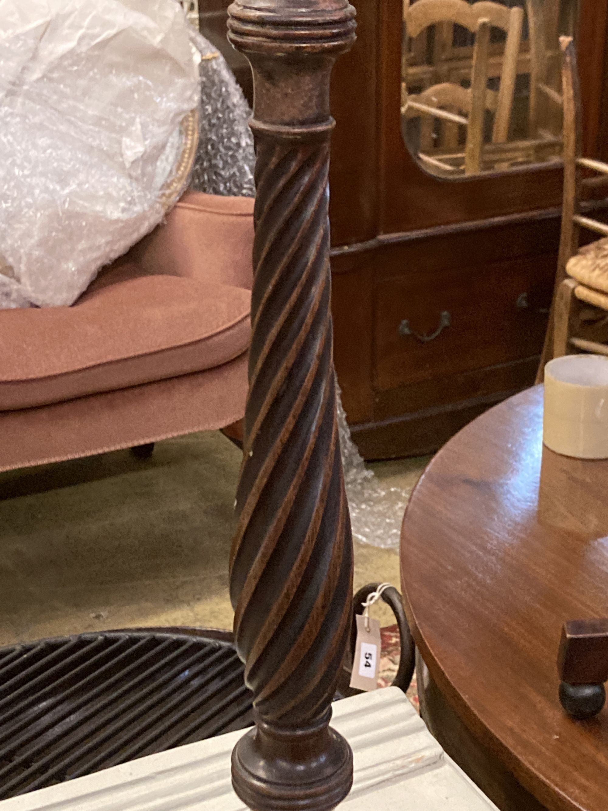 A Victorian mahogany pole screen, with oval tapestry banner, height 128cm